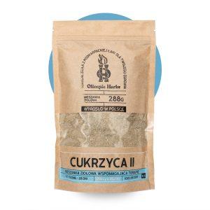 zdjęcie na białym tle produktu przedstawiające brązowe opakowanie z papieru ekologicznego z ziołami wewnątrz (Mieszanka ziołowa) na etykiecie znajdują się niebieskie elementy oznaczające serię ziół na CUKRZYCĘ Olimpic Herbs wspomagające na cukrzyca typu 2